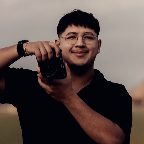 Alex Gallegos holding a cinema camera