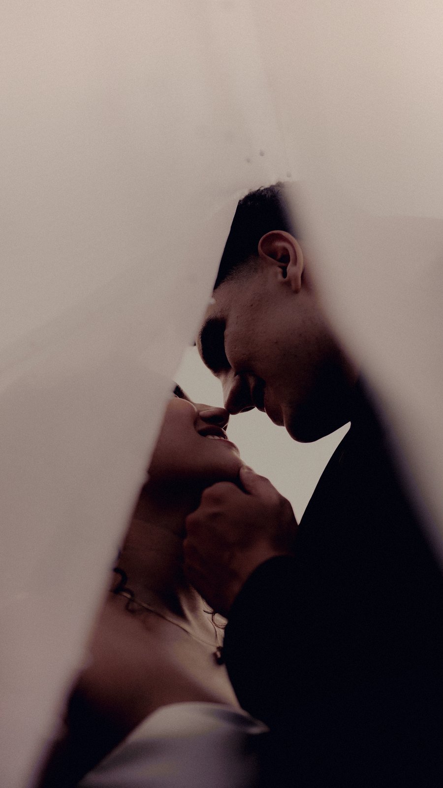 Samuel and Annie under the veil